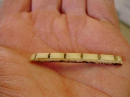 1963 ORIG FENDER STRATOCASTER NUT