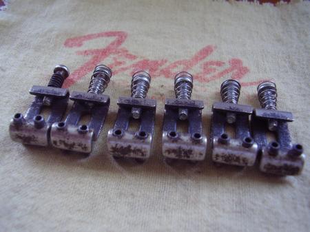 Cool Fender Strat Saddles with Scrapes tooling