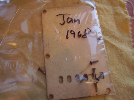 1968 ORIG DIRT UP BACK TREM COVER & SCREWS